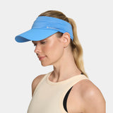 Missions Cooling Vibrant Blue visor on a white background on a woman