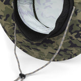 Close-up of the underside of a camouflage boonie hat with a black mesh ventilation panel, black trim, and a silver-and-black adjustable chin strap on a white background.