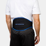Person wearing a black waist support belt with 'Mission' branding on a white background
