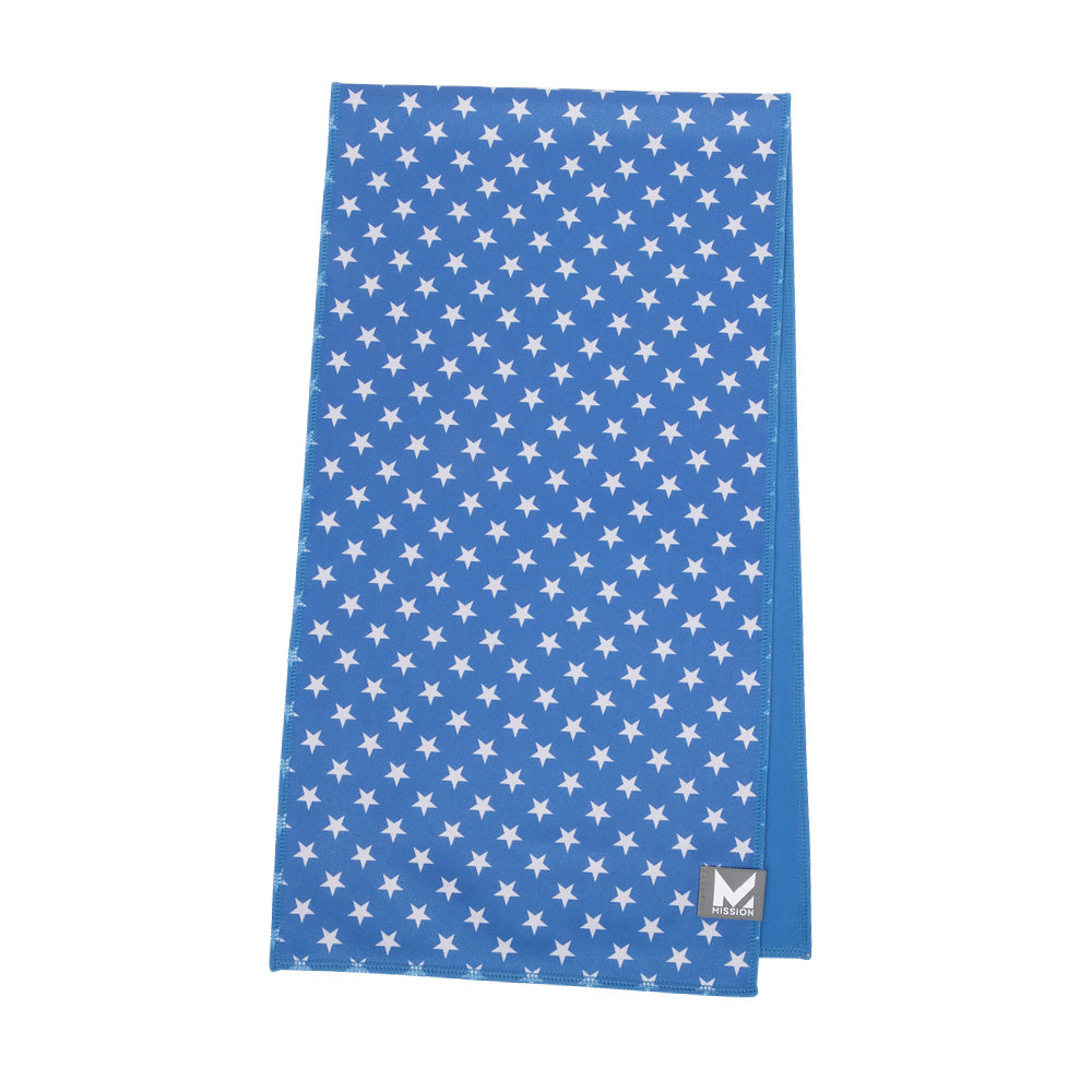 A blue fabric item, likely a towel or blanket, featuring a white star pattern and a small gray square logo with a white 'M' in the bottom right corner, shown against a plain white background.