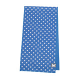 A blue fabric item, likely a towel or blanket, featuring a white star pattern and a small gray square logo with a white 'M' in the bottom right corner, shown against a plain white background.