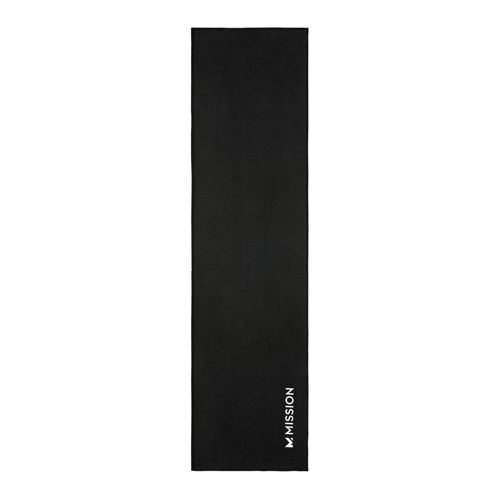 A long, narrow black rectangular mat or towel with the word 'MISSION' printed vertically in white near the lower right edge, shown on a plain white background.
