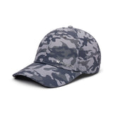 A baseball cap featuring a gray and navy blue camouflage pattern, with the 'MISSION' brand logo embroidered in white on the front panel, set against a plain white background.